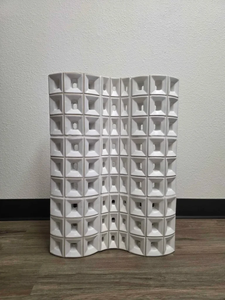 White Bent 90 breeze block feature wall